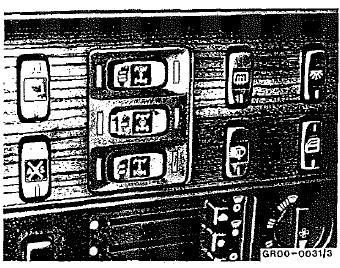1 Commutateur à touche, blocage de différentiel entre-ponts dans la boîte